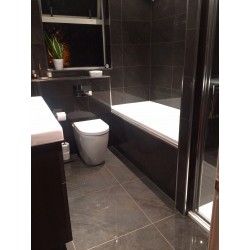 Polished Grey Tiled bathroom