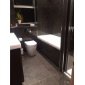 Polished Grey Tiled bathroom